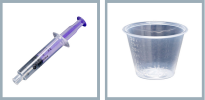 Purple and clear oral oyringe and clear medicine cup